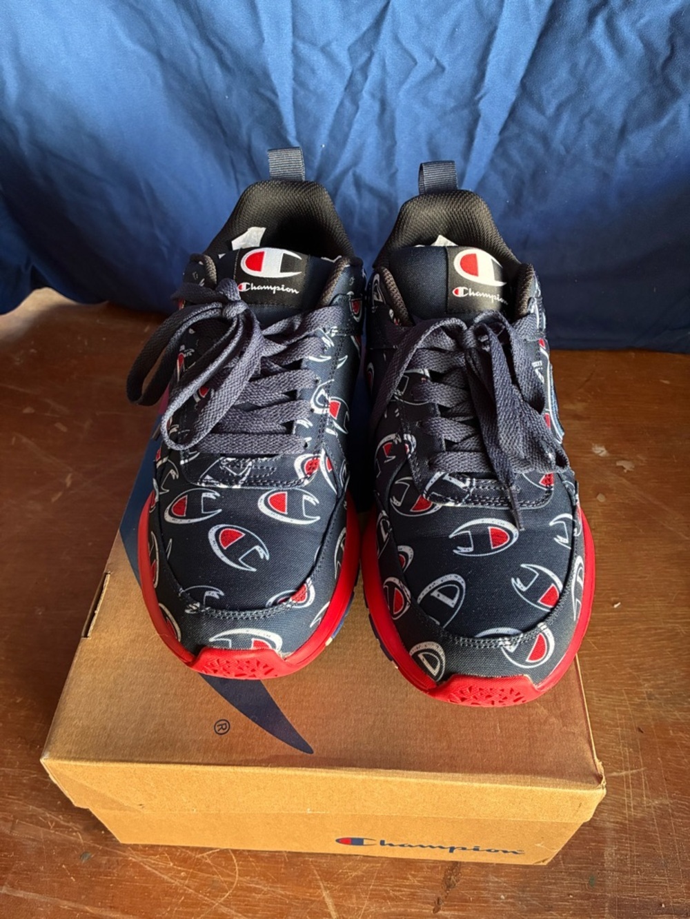 Champion Navy Sneakers with Red Accents and Logo Print